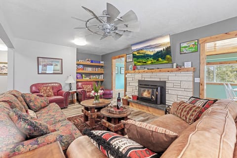 Living room on the main floor with a fireplace