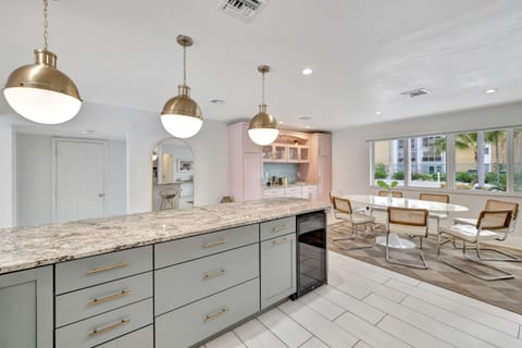 The airy, open kitchen offers ample space & all the comforts of home