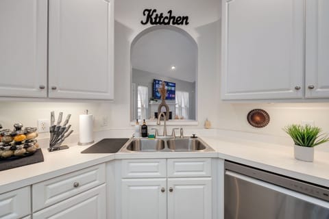 The fully stocked kitchen is perfect for cooking meals.