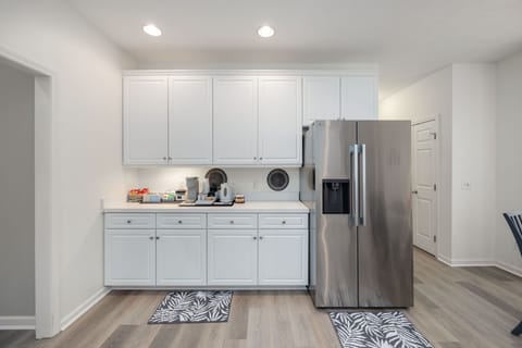 Large stainless steel refrigerator with ice maker/ water dispenser.