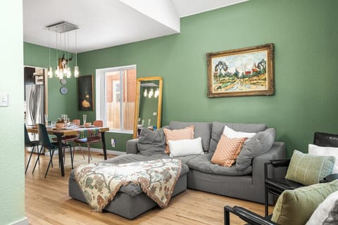 Upon entering you`ll be greeted by vaulted ceilings, natural light, and the perfect couch to plop down on after a long day of traveling