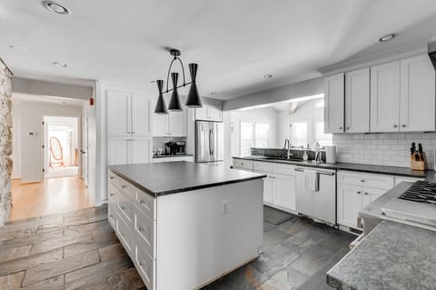 Kitchen Oasis: Sleek cabinetry, modern appliances, and a spacious island for culinary adventures!