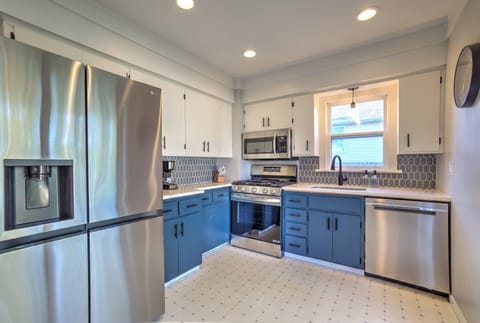 Bright, fully stocked kitchen for family meals and longer stays