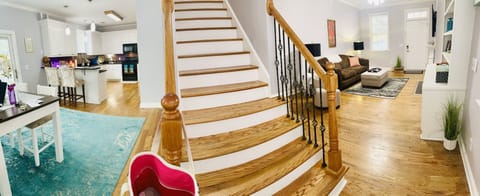 Open Floor Plan connecting The Living Room to the Dining Room and The Kitchen