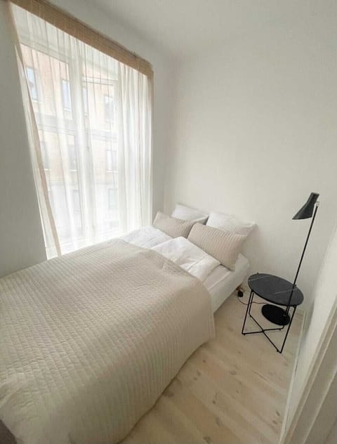 small bedroom with futon