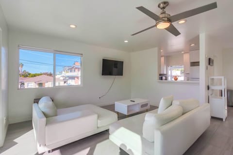 Reverse view of the living rom and kitchen