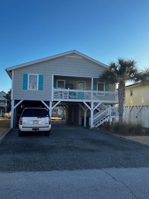 Front of home, covered parking available.