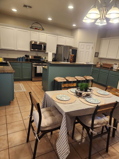 Set dining areas with stocked spice cabinet dishes for 8+