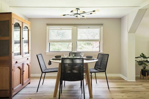 Our circular kitchen table seats four, and we have additional chairs to seat up to six people.