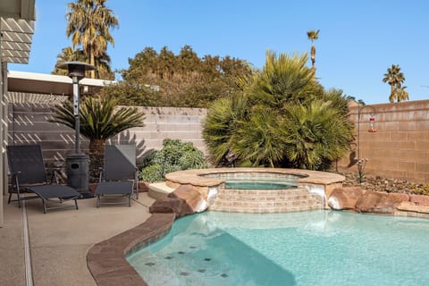 Loungers by the hot tub.
