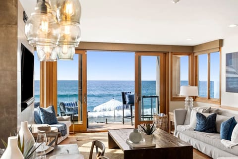 True oceanfront beach house in Oceanside, California with no street or sidewalk between the home and the sand. Guests enjoy nearby beach access, ocean views, and easy walks to the Oceanside Pier, restaurants, and coffee shopsPanoramic Oceanview