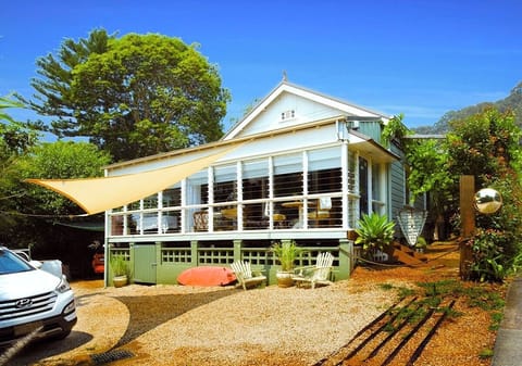The GRAPEViNE is the entire front and half left side of cottage + adjoin bedroom