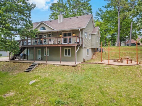 Enjoy the outdoors among the trees in a peaceful neighborhood on Beaver Lake.