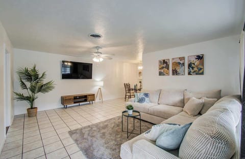 This spacious living room offers you and your companions plenty of space to sit back, stretch out, relax, and enjoy your favorite TV shows and movies!