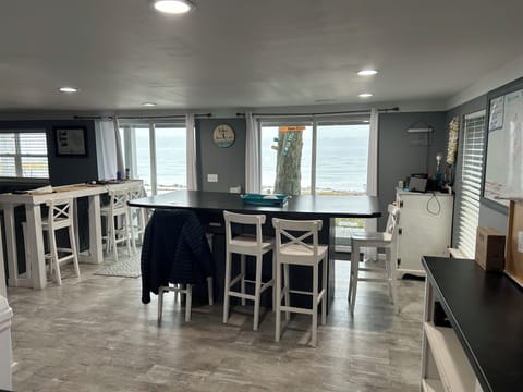 Table for 8, Counter with 4 more seats and 2 sliders out to deck and lake