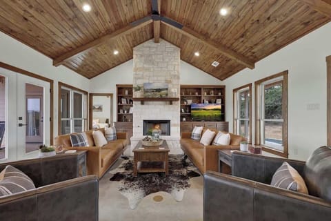 Gather in the living room around the fireplace on a chilly evening.