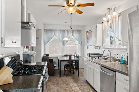 Kitchen with all new appliances, including gas stove, toaster oven, & Keurig