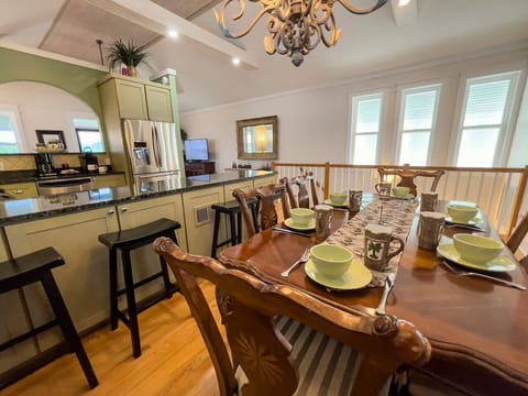 Open concept kitchen, dining and living space