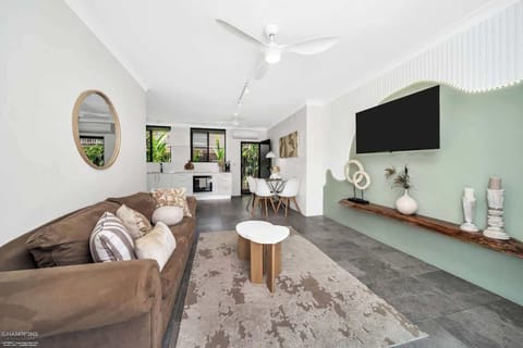 The stylish living area offers a comfortable spot to kick your feet up with a spot of TV or a cold drink to end the day.