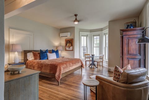 Bedroom with king bed and sitting area