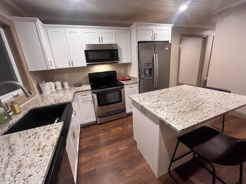 Center island with granite countertops