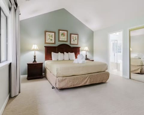 Unwind in a spacious king bed with soft, hotel-style linens.