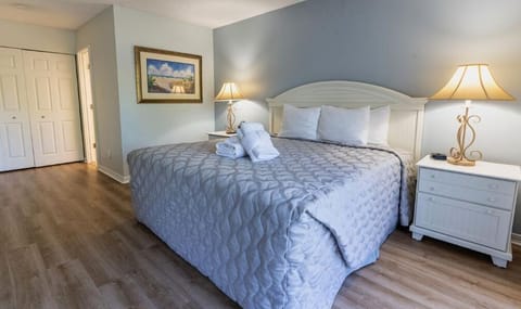 Sleep in serene comfort on a plush king bed.