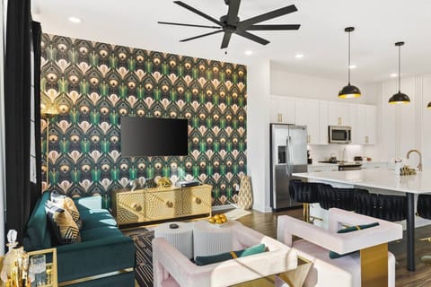 Spacious, stylish living room with a Smart TV and comfortable new furnishings for you to relax. Bar cart to make your favorite cocktail!