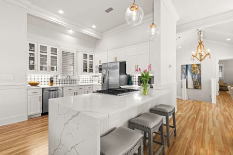 Updated kitchen is stylish and well-stocked