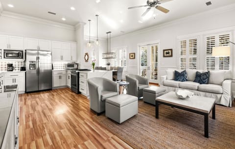 Living area flows into the kitchen - cold drinks always on hand for movie night