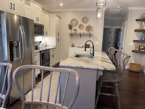 Side view of kitchen, equipped for cooking any type of meals.