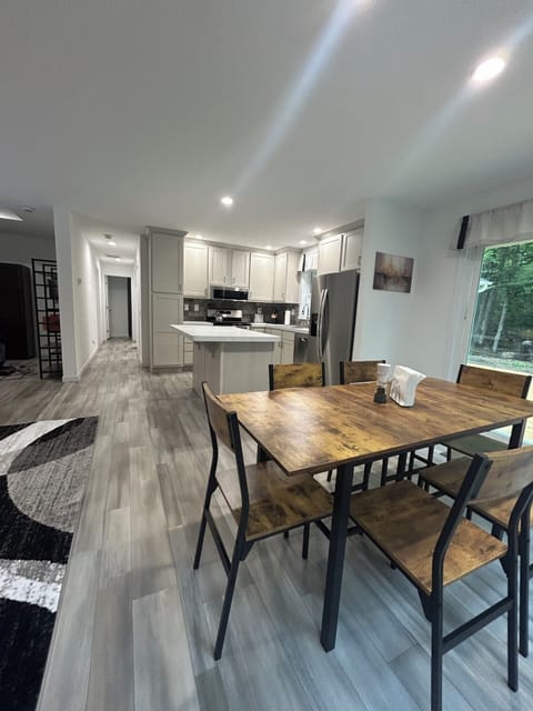 Dining and kitchen; hallway to bedrooms