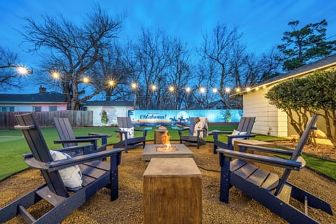 Backyard patio with adirondack chairs