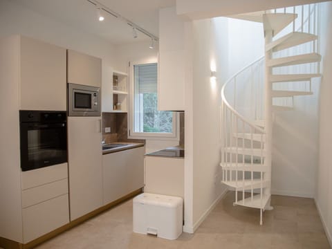 Interior Design, Flooring, Floor, Wall, Wood, Ceiling, Wood Flooring, Lighting, Light Fixture, Room