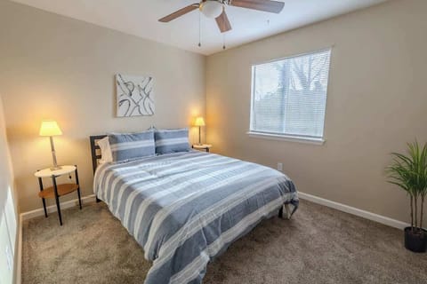 Bedroom with double bed and ceiling fan