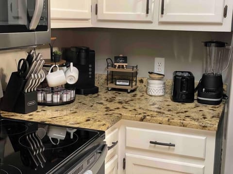 Fully stocked kitchen including rice maker, Turkey toaster, baking pans, mixer. 