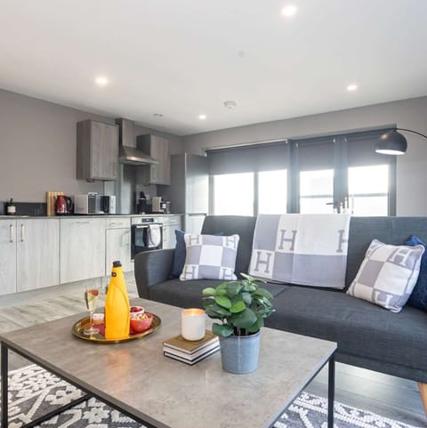 Your open plan kitchen and living space, perfectly set up for cooking, dining and relaxing together on Liverpool's waterfront
