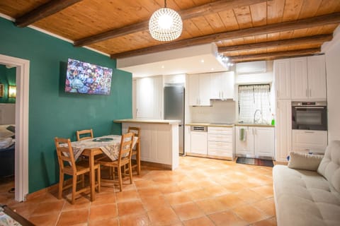 Living area%2C dining area and kitchenette