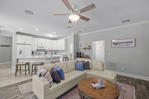 Kick off your shoes and get comfy — this breezy, coastal-inspired living space was made for laid-back moments.