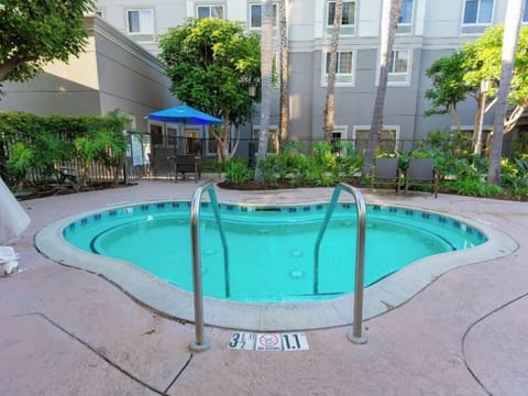 Unwind after adventures in the bubbling courtyard hot tub.