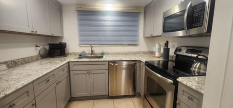 Kitchen - Newly remodeled with new cabinets and countertop!