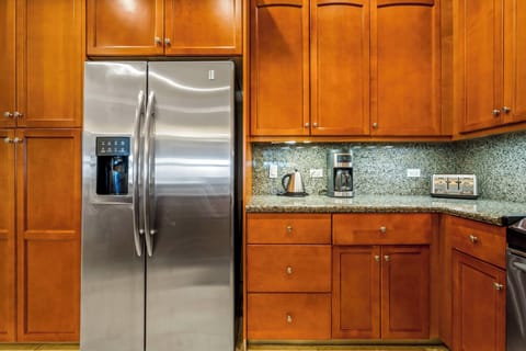 Kitchen with toaster, dishwasher, coffee maker and more
