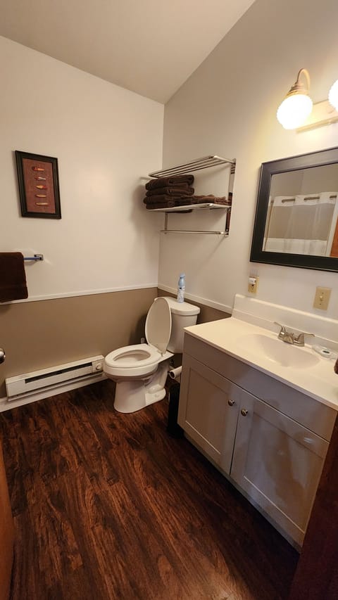 Bathroom with shower stall. Bath linens provided.