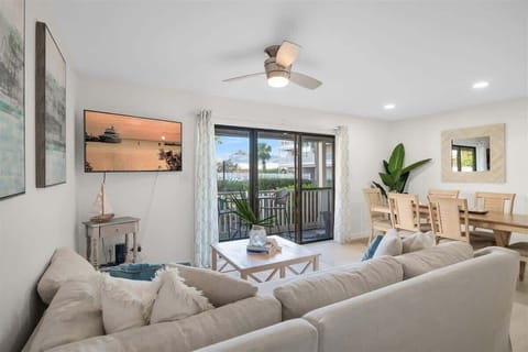 Living room: Smart TV, patio access