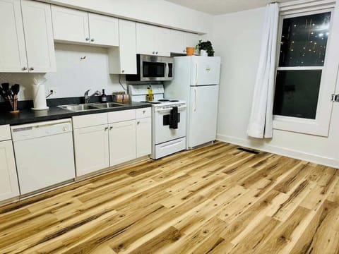 Whether you're making breakfast or cocktails, this sleek kitchen has everything you need.  #LuxuryLiving