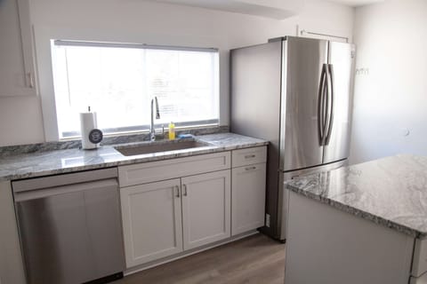Kitchen- Fully equipped, granite counters, and stainless steel appliances for all your cooking needs.