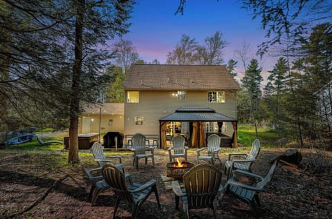 The Perfect Evening Escape! Enjoy a crackling fire, fresh air, and good company in this peaceful backyard retreat.