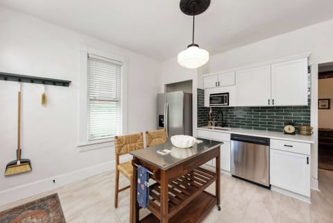 Create culinary masterpieces or enjoy exceptional take-out in the stylish kitchen