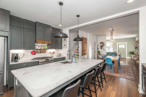 The elegant, open kitchen offers ample space & all the comforts of home