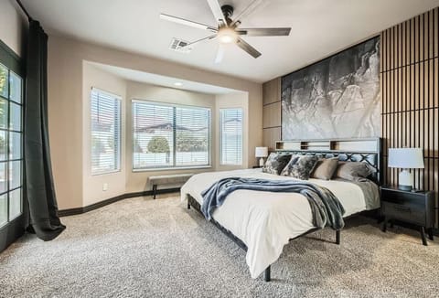 The master bedroom includes a king size bed and an ensuite bathroom.